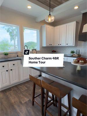 Is the Southern Charm 4BR the ultimate modern farmhouse? 🤔 #claytonhomes #manufacturedhomes #modularhomes #mobilehome #mobilehomeliving #doublewidedream #doublewide #prefabhouse #hometour #housetour #farmhousedecor #farmhousestyle #farmhousekitchen #farmhouseliving 