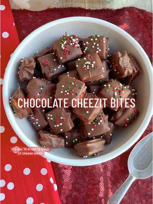 12 Days of Cheese Day1️⃣0️⃣- Chocolate Cheezit Bites! I’m not gonna lie to ya…as with anything chocolate dipped, these are a little bit of a labor of love. BUT, it is SO WORTH IT! These salty sweet bites are straight heaven. But be warned, they have a strange tendency to disappear into thin air!🍫🧀 •96 @Cheez-It crackers •¼ cup creamy peanut butter •1 cup milk chocolate chips •1 tsp refined coconut oil •Red and green nonpareil sprinkles 1.Arrange 48 crackers on a parchment paper lined baking sheet. Top each cracker with ¼ tsp peanut butter in the center of the cracker. (I think it’s easiest to put the peanut butter in a piping bag, cut off a small tip, and pipe the peanut butter onto the cracker.) Top the peanut butter with the remaining crackers to make a sandwich. Place in the freezer for 15 mins to set the peanut butter. 2.Add chocolate chips and coconut oil to a microwave safe bowl. Microwave for 30 seconds, stir, and continue microwaving and stirring in 15 second intervals until the chocolate is completely melted. (This should not take more than 60-75 seconds.) 3.Working one at a time, drop a cracker sandwich in the chocolate. Use a fork to completely coat the cracker then lift the cracker out of the chocolate. Gently tap the fork against the edge of the bowl to allow any excess chocolate to drip off. Place cracker back on the baking sheet, and repeat with remaining crackers. Top with sprinkles, if desired. 4.Place baking sheet in the fridge for at least 2 hours to set the chocolate. Enjoy! #cheezit #chocolate #peanutbutter #SnackTime #saltysweet #holidayrecipes #EasyRecipe 