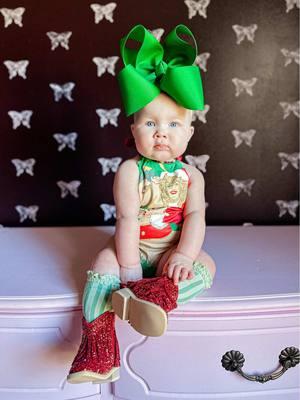 As obsessed with Dolly as I am, did y’all really think I would ever put a basic bow on her 🤷🏼‍♀️ outfit by me again, Armadillo Designs! Bow is Navy Jo Boutique :) @Little Stocking Co. @A BEAR CO LLC @Dolly Parton  #bigbow #dollyparton #hollydollychristmas #westernfashion #westernbaby #babygirl Big bow handmade baby clothes Western baby girl fashion Baby girl outfit inspo