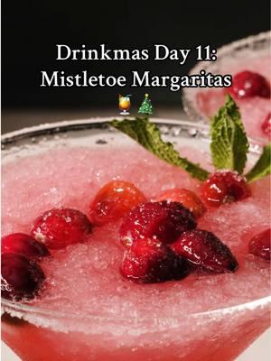 Cranberry juice adds the bright color and seasonal spin to these margs, turning the classic summer drink into mistletoe margaritas. With one of these, you just might find yourself under the mistletoe by the end of the night 💋  #drinks #cocktails #holiday #drinkmas #howto #margarita #mistletoe