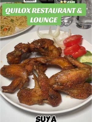 Quilox Lounge!! #bigschlimsreviews #suya #chicken #tilapia #puffpuff #jollof #indomie #ayamase #goodeats #lounge #quiloxloungedc #dmvtiktok #dmvfoodie I was on this block in N.W. D.C. about 3 months ago reviewing. This spot caught my eye, & I made sure that I came back, & pulled up!! It was a whole vibe in there!! Let’s GO!! . Where I am: @quiloxlounge . Location Reviewed: 7303 Georgia Ave., N.W. Washington D.C. . Items Reviewed: DELICIOUS. Their Indomie ($20 ramen noodles with fried eggs). Nicely spiced…good. That’s it. STAMP!! Their Suya Wings ($20 6 whole Suya spiced fried wings with onions, tomatoes, & cucumbers). Fried hard with that Suya spice kick, kind of curry, & jerk season tasting. LIKE THAT!! Their Grilled Tilapia Platter ($30 a whole tilapia with onions, sauce, Jollof rice-STAMP, red, green, & yellow peppers). Very well seasoned, tender, & tasty!! Get that Jollof!! STAMP! Their Ayamase Stew ($20 a goat, chicken liver, & beef stew with rice). Different, more savory than spicy, definitely an acquired taste!! I like it!! STAMP!! Their Puff Puff ($6 Fried donut balls with a caramel drizzle). Hot, fresh, and tasty!! . Customer Service: On Point. . Parking: ROUGH!! . Recommendations: Their Pizza!! That fajita, & their tacos!! . The Inside: Clean, with upstairs, & downstairs seating. ⭐️⭐️⭐️⭐️⭐️=STAMP ⭐️⭐️⭐️⭐️➕=LIKE THAT  ⭐️⭐️⭐️⭐️=DELICIOUS ⭐️⭐️⭐️=DECENT  ⭐️⭐️=PASS ⭐️=NAH #Bigschlimsreviews