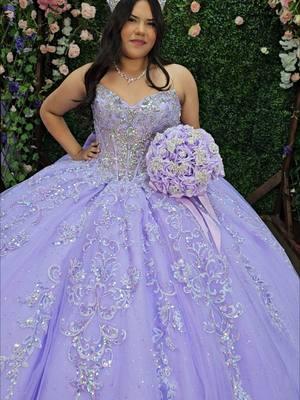 Gorgeous lilac and silver gown 💜 . Ready to shop for your dream dress? Schedule an appointment with us at thequinceshop.com or give us a call at: . Quinceaneras and Bridals Boutique 210-913-8315  6151 NW Loop 410 ste 106 San Antonio, TX 78238 . #Lilac #purple #Quince #quinceañera #xv #dress #dresses #vestidos #thatshopwiththecarriage #thequinceshop #sofiathefirst #princess #ballgown  #rapunzel 