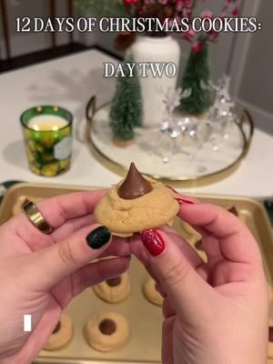 Only took us til day 2 to get to Peanut Butter Blossoms, and for good reason! Sally’s Baking Addiction has the BEST recipe for these soft and gooey christmas cookies. #peanutbutterblossoms #peanutbuttercookies #christmascookies #christmascookie #christmasvlog #12daysofchristmascookies #peanutbutter #cookies #easycookierecipe #Vlogmas #homebaker #christmastiktok #Vlog #easycookies #christmasdessert 