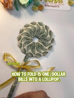 How to fold 15 one-dollar  bills into a lollipop.#giftideas #easytutorial #origami #howto #DIY #dollar #money #christmasgift #giftguide #lollipop 