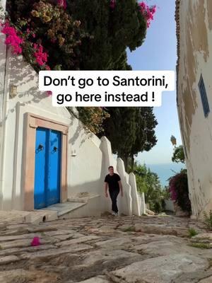 Skip Santorini and go here instead! Welcome to the hidden gem of Sidi bou said, a city that looks like Santorini but with less crowds and better prices! Sidi Bou Said is located just outside of Tunisia’s capital of Tunis and is an absolute dream!  Can’t recommend this place enough! Tunisia has so many beautiful spots with better prices and less tourists!  Follow @benbookstheworld for more!  Tunisia | Sidi Bou said | Tunisia tourism | Hidden gems | Mediterranean | Underrated destinations |  #sidibousaid #sidibousaid💙 #visittunisia🇹🇳 #tunisiatourism #hiddengem #underrateddestinations #mustvisitplaces #beachtowns #tunisiatravel 