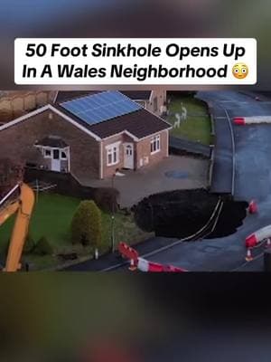 A massive sinkhole in a wales neighborhood has forced residents to evacuate. 🎥: ITV Wales #weather #sinkhole #Wales #unitedkingdom #england #safety #fyp 