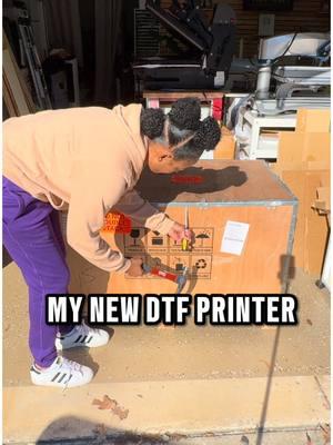 Huge delivery!  My new DTF Printer is here Part 1!   One thing about me…Km honna find a way to get my work done and find a way to get help. But this set up was alot. The full bideo is on my YT Channel linked in my you know what!    #ricoma #revelaire #dtfprinter #desktopdtf #directtofilm #fyp #workfromhome #tiktokbusiness #blackgirlboss #garageoffice #bigbusiness #sidehustle #gettingmoney #