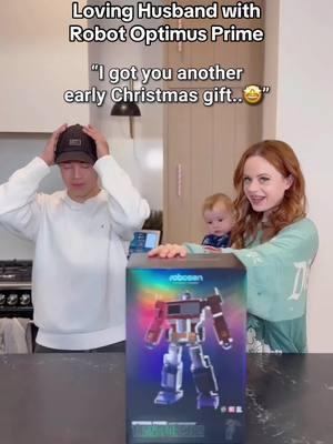 Josh.exe is broken… and almost broke Optimus Prime 😂 #couplegoals #christmasgift #transformers #optimusprime #robosen #couplereaction #reaction #surprise #momlife #boymom #momof4 #familyof6 #suerose 