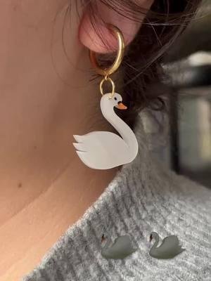 Odette and Odile 🦢🎀🩷 Swan lake was my favorite Barbie movie EVER. she ate 😂💯  These cuties will be dropping tomorrow and I have plenty opportunities for these earrings to match OR mix and match  #swanlake #swans #swanearrings #blackswan #whiteswan #swanlakebarbie #swanlakeballet #earrings 