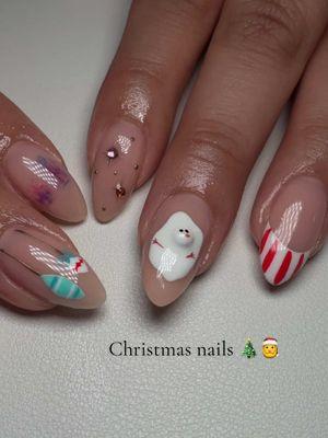 From the holiday chaos to ✨perfection✨! 🎄 These festive nails are giving cozy winter vibes, complete with candy cane stripes, plaid patterns, and the cutest 3D snowman! Who else loves a cute winter design for nail inspo? ❤️ inspo: @nailedby_ash  #holidaynails #winternails #festivenails #christmasnails #nailtransformation #nailinspo #glitternails #3DNails #dallasnailtech #planonails #planonailtech #dallasnails 