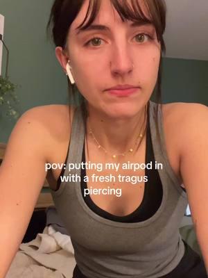 🥲 #traguspiercing #newpiercing #airpods #fyp #trending #viralvideo 