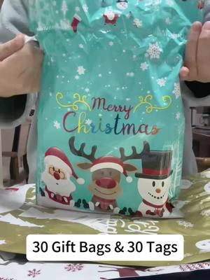 These drawstring gift bags saved me so much time this year and all the presents still look super cute! These sell out super quick, grab them now so you have them in time for Christmas! #drawstringgiftbags #giftbags #christmasbags #christmasgiftbags #wrappingbags #presentwrapping #wrappinggifts #giftwrap #christmasgiftwrapping #qvc #giftbagset #gifttags #christmasgifttags 