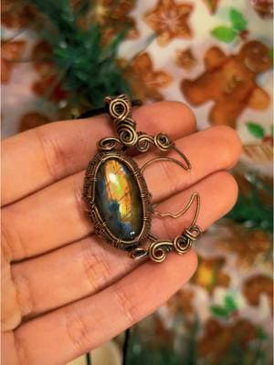 This labradorite is stunning! I love the moon wire wrap design 🌜🧡 #wirewrap #crystalnecklace #fyp #labradorite #moonnecklace #viraltiktok 