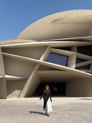 The National Museum of Qatar was designed to resemble a “desert rose,” which is a mineral formation of fractured crystal clusters (seen in a clip here). It’s a beautiful futuristic-looking space and well worth the visit if you’re in Doha! 🤩🌹 #dohaqatar #visitqatar #travelinginstyle #nationalmuseumofqatar #architecture #moderndesign #desertrose #traveltiktok 