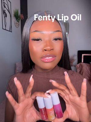 New Fenty Lip oil trio **Passion Fruit **Barbados Cherry **Kalahari #lipoil #newmakeup #glossylips #fentybeauty #fentyskin #lipmask #skincare #drylips #lipoil #FentyBeauty #PerfectPucker #HydratedLips #fentynewarrivals #tiktokshopnewarrivals #SelfCareFinds #FruitQuenchz 