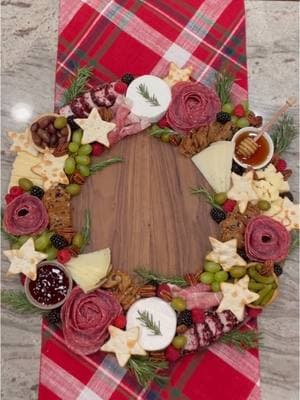 Charcuterie Wreath Board! 😍🎄🧀 Salami roses and festive star crackers are surrounded by an assortment of fresh fruits, cheeses, olives and all the go-withers. Your guests won’t be able to get enough of it!  Details can be found at the link in bio! What you'll need: 🍯 Spreads: honey, mixed fruit preserves 🫒 Accompaniments: green and kalamata olives, cornichons 🧀 Cheese: creamy brie, aged white cheddar, herb goat cheese log 🍇 Fruits: green grapes, raspberries, blackberries 🍗 Meat: applewood smoked salami, Genoa salami bites 🤎 Crackers: fig and olive crisps, star-shaped crackers 🌿 Herbs: fresh rosemary #charcuteriewreath #charcuterie #charcuterieboard #cheeseboard #christmas #holidayboard #holidayappetizer #christmasappetizer 