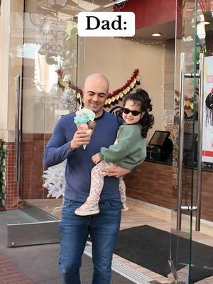 Why do dads always give in to their daughters' every whim and act like they're competing for "Father of the Year" with their generosity? I told my daughter "no" to ice cream, and suddenly I see him strolling out of the ice cream shop, holding an ice cream cone ten scoop high that could feed a small village, and our daughter perched on his shoulder like a queen. Should I be happy that he only bought  the biggest cone, and not the entire ice cream shop? #fyp #viral #family #toddler #baby #MomsofTikTok #dadsoftiktok #girldad #daddy #papa #funny 