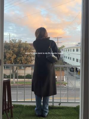 The awkwardness level was close to filming a fit check in public. But at least the sunset was gorgeous.  @UNIQLO USA coat, @H&M sweater, @Levi’s jeans, @Nordstrom Rack boots, @Coach bag  #ootdinspo #fitcheck #winterfashion #winteroutfitideas #blackcoat 