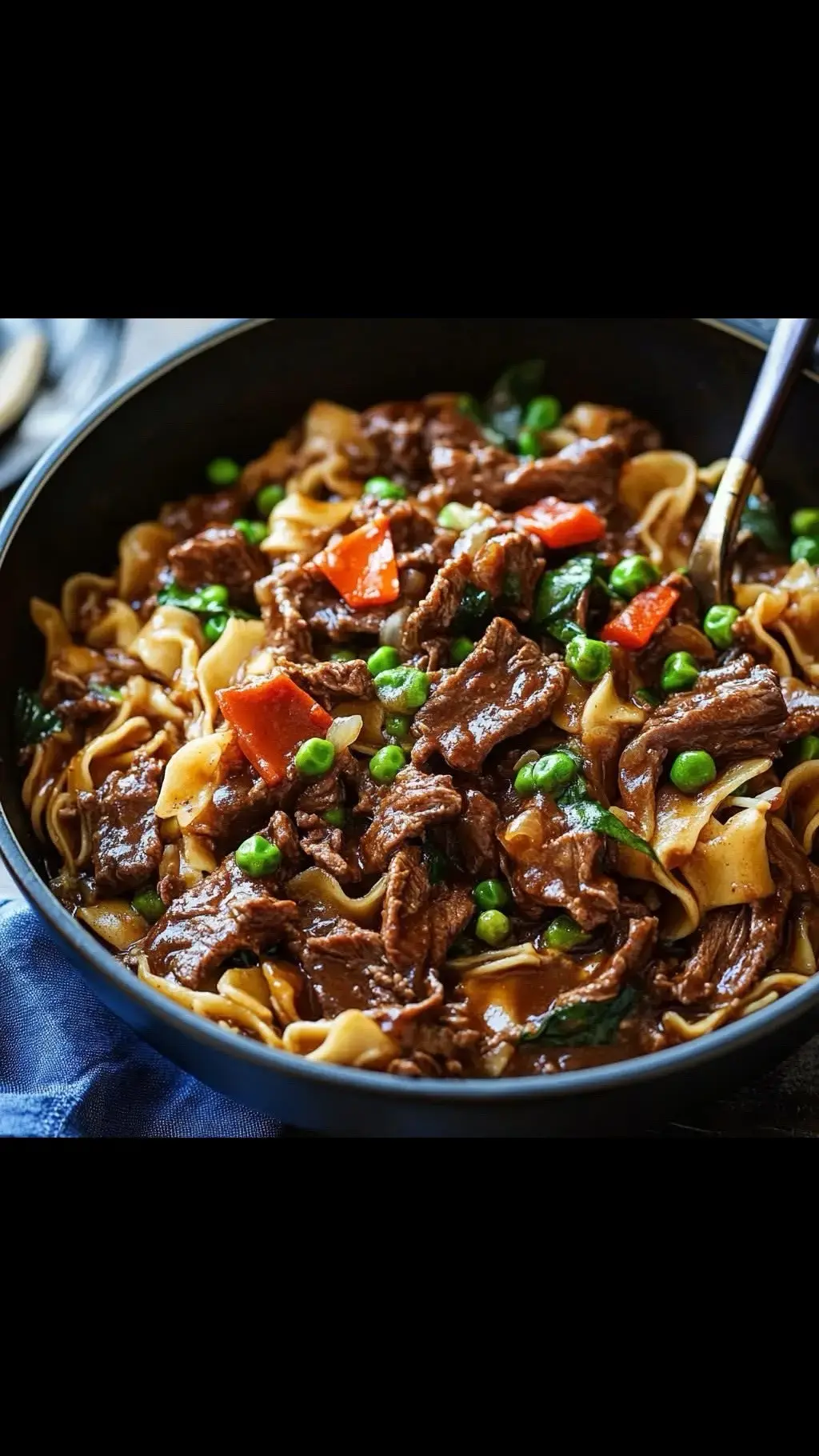 Beef and Noodles Ingredients 2 teaspoons kosher salt 2 teaspoons ground black pepper 3 pounds chuck roast (trimmed) 2 tablespoons olive oil 2 cups diced carrots 1 cup diced onion 3 cloves garlic, minced 2 tablespoons tomato paste 4 cups beef stock 2 cups water 2 tablespoons fresh thyme 2 bay leaves 12 ounces egg noodles 1/2 cup frozen peas Instructions Preheat oven to 325°F. Season chuck roast with salt and pepper; set aside. Heat oil in a large oven-safe Dutch oven over medium-high heat. Sear roast on all sides. Remove and set aside. Sauté carrots and onion in the same pot until softened. Add garlic and cook briefly. Stir in tomato paste, then add beef stock, water, thyme, and bay leaves. Bring to a boil. Return beef to the pot, cover, and bake for 2.5–3 hours until tender. Shred beef directly in the pot, then bring the mixture to a simmer. Add noodles and peas, cooking until noodles are tender (10–12 minutes). Serve hot and enjoy! #BeefAndNoodles #ComfortFood #HomemadeMeals #FamilyDinner #EasyRecipes #WinterWarmth #RecipeInspo #HeartyDinners #FoodieFavorites #CozyEats #MealPrep #SimpleCooking #WeekendRecipes #DinnerIsServed #YummyEats #SlowCooked #ClassicRecipes #BeefLovers #NoodleHeaven #FoodForTheSoul