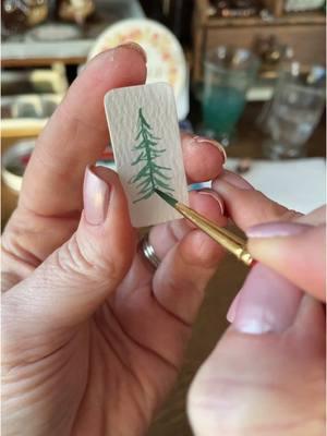 Miniature painting isn’t easy for me but I kinda like this messy little tree🎄🥰 #miniature #minipainting #watercolor #pendant #watercolorpainting #glass #vintage #christmas #christmastrees #thevintagejournal #pov #relax #chill #vibes #calm 