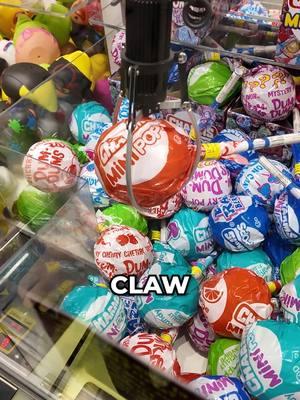 I Won a giant lollipop and this was inside.. #clawmachine #cranegame #arcadegames #arcade #foryou #foryoupage #lollipop #clawgame 