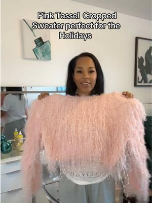 If I had a Christmas party to go to I would definitely wear this Cropped Sweater…maybe my News Years Look #TikTokShop #sweater #sweaterstyle #croptop #pink #fyp #holidaypartyoutfit #holiday #ttsacl #foryoupage #trending #tiktokshopholidayhaul #style #tassel #spruce #reviews 