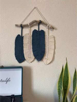 Macrame feather hanging made in the colors Indigo, and Cream from @Nook Theory TikTok • Wall hanging is available on my Etsy shop.  • #macrame #macrameartist #macrameart #macramewallhanging #macramedecor #macramelove #macramefeather #wallart #handmadecraft #bohodecor #wallhanging #angscraftsncreations 