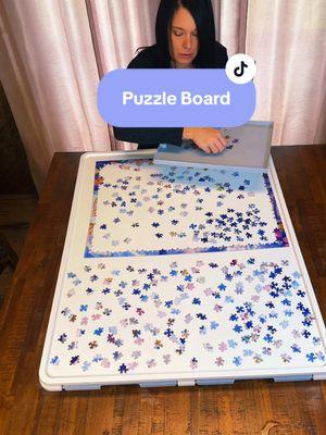 Love, love love this puzzle board. We are a family of puzzle nerds and this board has made doing puzzles even more enjoyable. #puzzle #puzzleboard #puzzletable #rotatingpuzzleboard #musthaves #giftideas 