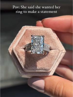 Bold and beautiful in every way! This 7.6-carat radiant cut with a wide pavé diamond band definitely makes a luxurious statement. 💎 We love to create custom rings and the process is easy with our perfect ring promise. Start your engagement ring journey with us either in store or online 💍 #RadiantCut #CustomJewelry #customring #customengagementring #ringdesign #dreamring #bigradiant #bigdiamond #bde #bigdiamondenergy