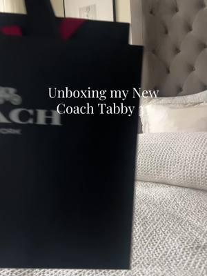 Unboxing My Tabby 33 #coachbags #unboxing #coachunboxing #coachtabbybag #coachtabby33 #newcoachpurse #coachusa #christmasgiftideas #christmascameearly #giftsforher #giftideas #coachtabby #coachpurses #coachpursecollection #coachoutlet #girlasthetic  #wifey #fyp #besthusbandever #supportivehusband #spoliedwife #thankyouhubby #spoliedblackwife #christmasgifts2024 #coachcrossbodybag #coachhandbags #coachpurseunboxing #pursecollection #purseunboxing #bagunboxing #bagsfordays #shopping #bestgiftsforher #treatyourself #treatyourwife #wifeyvibes #tiktok #girlsoftiktok 