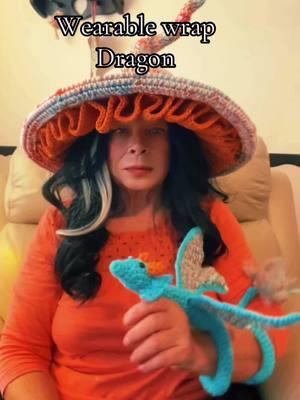 Yay! Crocheted the dragon pattern from Lisa Be Stitchin Can’t wait to gift this to my middle grand. This is a fairly quick make. It does use wire in the body and wings. #dragon #wearabledragon #christmas #christmas2024 #granddaughter #christmasgift #amigurumi #amigurumidragon  #Crochet #crocheting #lovecrochet #crochettiktok #crochettok #crochetaddict 