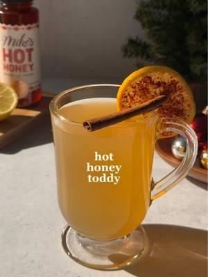 The only thing better than a Hot Toddy is a Hot Honey Toddy! 🔥🍯 Ad Thanks to @Mike’s Hot Honey, we’re elevating this classic recipe. I can’t think of a cozier beverage!  Here's how to make it: • Hot Honey Toddy • 1.5 oz bourbon .5 oz Mike’s Hot Honey .75 oz lemon juice  Top w/ hot water Stir  Garnish w/ chili lemon wheel + cinnamon stick Enjoy! You can find Mike's Hot Honey in the honey aisle at your local grocery store! #thatsthespirits #24daysofholidayspirits #holidayspirits #mikeshothoney #hothoney #honey #hothoneytoddy #hottoddy #holidaydrink #christmas #christmascocktail #christmasdrink #cocktail #drink