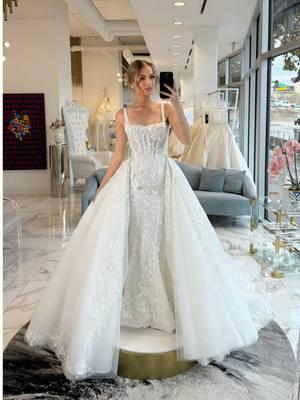 In LOVE with this gorgeous wedding gown! ✨🤍  Stunning beaded strap corset sheath in 3D floral beaded lace with a voluminous matching over-skirt!... Isn't beautiful!? 🤩 Experience true luxury, find your dream dress and become an #IconicBride 🤍 #iconicbridedallas #texas #bridaltrends #weddinginspo #weddinginspiration #weddingtiktok #bridaldress 