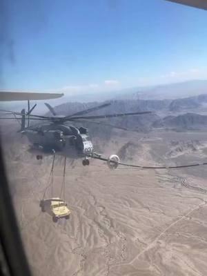 CH-53E Super Stallion carrying a HMMWV and refueling from a KC-130 Hercules. #machinepix #engineer #engineering #howitsmade #manufacturing #aviation #marines #pilot #helicopter 