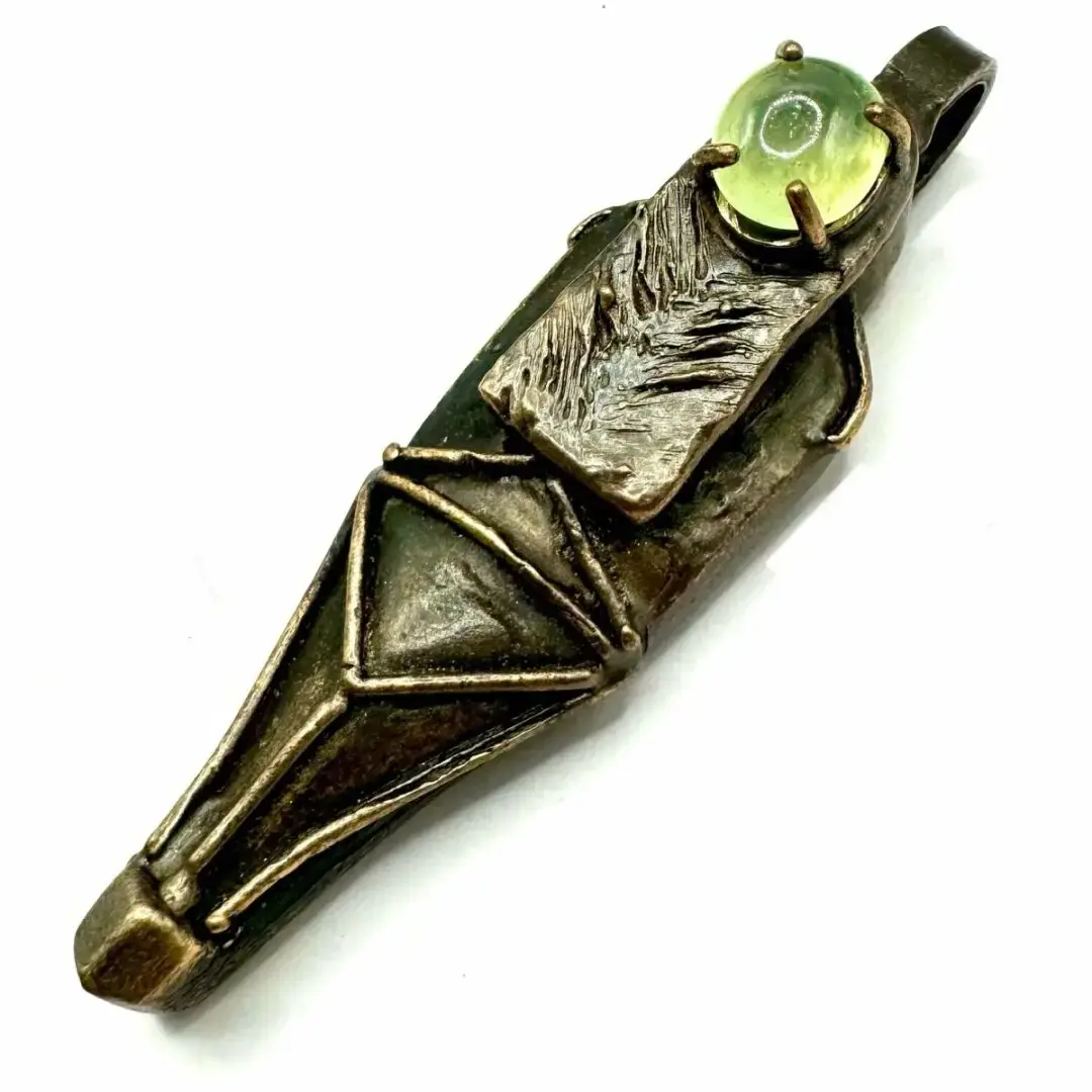 Dark Deals have surfaced from the shadows—are you brave enough to claim them? 🖤💀 Ushabti Bronze Prehnite Talisman # #Mensrings #Mensjewelry #Bold #Alternative #Creations #Gothic #Punk #Statement #Fashion Buy here https://julianthe2nd.com/products/bronze-brutalist-ring-15