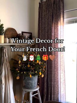 Vintage Decor for Your French Door!  French doors are a stunning feature in any home, but sometimes you need privacy or to block out the sun. Vintage patterns are a great option for adding charm, and there are plenty of curtain styles to suit your needs, from light and airy to more substantial fabrics for added warmth and privacy. Curtain details: Sara Le/ Scarlett/ Pinch Pleat  cr: IG@lori.dail #twopagescurtains #twopageshome #christmas #holidaytiktok #cozyathome #entryway #entrywaydecor #holidaycountdown #christmasdecor 