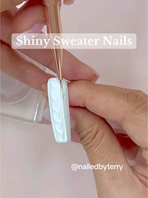 🚨Nail Hack🚨 Shiny Sweater Nails. 🤍❄️ Now you can wear white sweater with no worries of staining or getting dirty 🙌🏼 💅✨🤍❄️ #sweaternails #winternails #nails #nailart #nailhack #nailtutorial #easynailart #christmasnails #3dnails #cutenails #nailedbyterry #kiarasky #wakeupandmakeup #nailtech