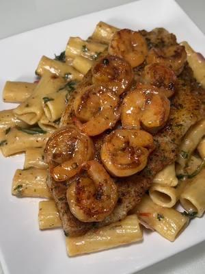 Alfredo mane with love. Shrimp and catfish alfredo. Yall go follow @mr.goalchaser page!  #creator #creatorsearchinsights #food #dinner #dinneridea #whatmyhusbandcooksforme #chef #mencook #mencooking #catfish #dinnerwithme #homemadedinner 