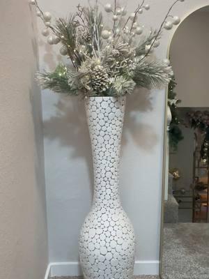 Currently in my Neutral Décor Era! 🤍 Flowers are my love language, therefore, I have a plethora of vase This is one of my favorite vase to style! It’s one of those decorative vessels that never goes out of styles.  It fits perfectly in this #cornerofmyhome  Because it is a floor model vase, I have to get innovative when I style it! I placed chicken wire inside to keep the steps in place. It works every time and it keep the flower height at site level!  I love this white ones, because of its neutral tone, you can arrange any type of floral in it! It also come in black!  Get your today, because they’re always sold out!  I repurposed the florals from a few years ago, I got them from HobbyLobby!  Comment VASE and I will send you the links to shop my vase!  Home decor | Vase | Christmas Decorations |  Happy Holidays  #viral #trending #innovation #viral #pinterestinspired #aesthetics #christmasdecor #1111 #homefortheholidays 