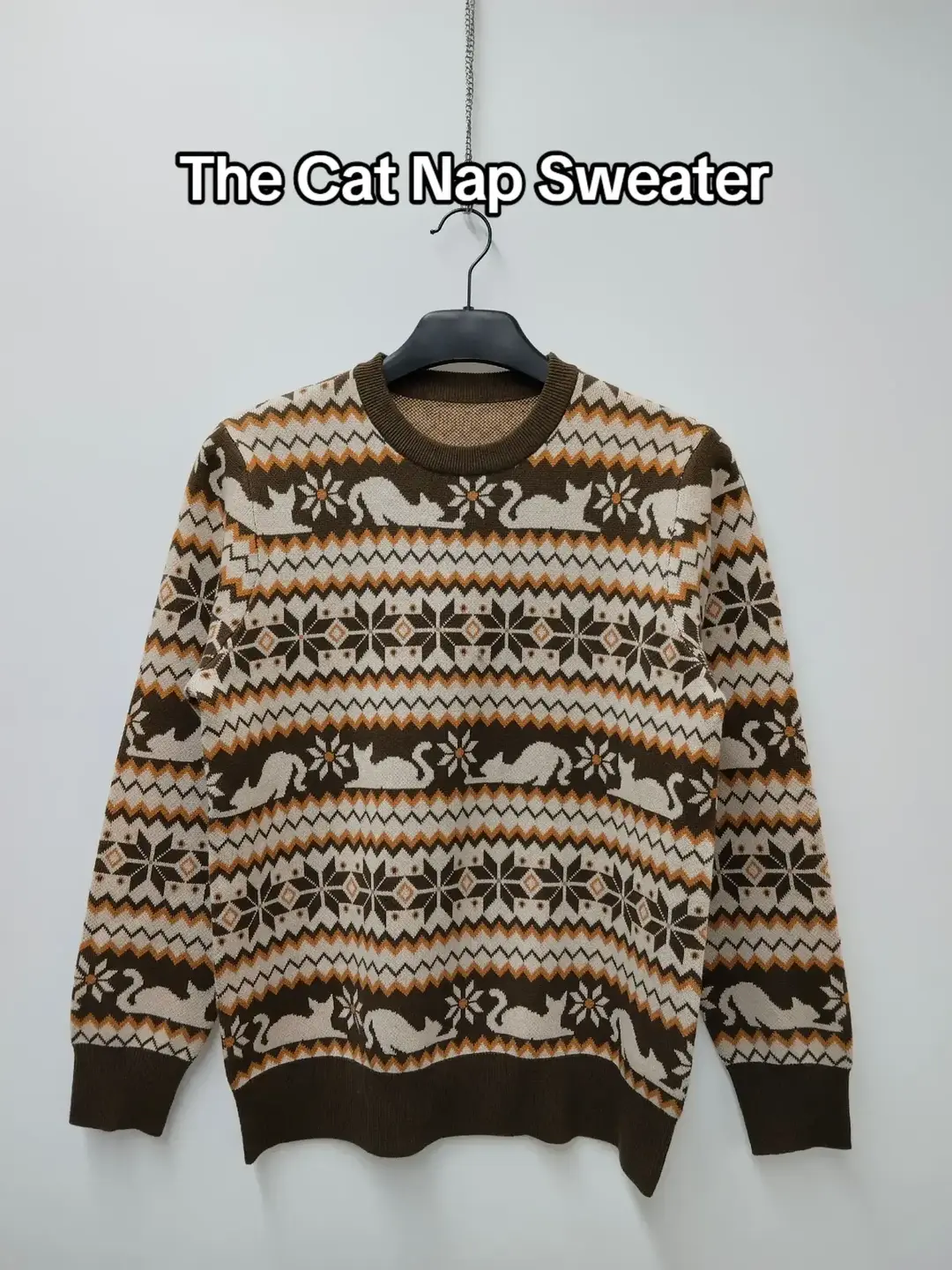 First look at our upcoming Cat Nap Sweater, which will release in early January. We love cats! Adopting Matilda was one of the best decisions we ever made. People have been asking for a "normal" (aka not chaotic) cat design for a while, and the timing for this one just seemed right. This design is a mocha Fair Isle-style sweater featuring a bunch of lazy cats on it. We love our two cats and crack up every time we see them stretch dramatically before taking their fiftieth nap of the day. This sweater is a tribute to that silly pose. You can join the Wait List for the Cat Nap Sweater now. You also have to say "OOH, BIG STRETCH!" every time you see your cat pull this move. #fyp #foryou #clothingbrand #OOTD #sleepypeach #smallbusinesscheck #smallbusinessowner #teddyfresh #lazyoaf #golfwang #golflefleur #mokuyobi #cat #catsoftiktok #catlover #cattok 