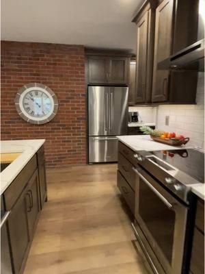 This full kitchen remodel story is now posted to the #villagehomestores blog. Find a link to see it (and more of our work) in our profile. Shown: Koch Cabinets in the Prairie door and Hickory Stone stain with MSI Q Quartz Calacatta Laza counters n CoreTec Madrid Oak floors. Kitchen materials and complete remodel by the Quad Cities area kitchen remodel experts at Village Home Stores. 