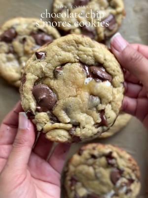 S'mores Cookies Recipe Yield: 9-10 cookies Ingredients: For the Cookies: - 1/2 cup (115g) unsalted butter, melted and cooled - 1/2 cup (100g) light brown sugar - 1/3 cup (67g) granulated sugar - 1 large egg, room temperature - 1 tablespoon (15g) vanilla extract - 1 1/4 cups (185g) all-purpose flour, spooned and leveled - 1/2 teaspoon baking soda - pinch of flaky sea salt - 1 cup (120g) semi-sweet chocolate chips For the S'mores Topping: - 1/2 cup (60g) milk chocolate wafers - 1/2 cup (30g) mini marshmallows or 9-10 large marshmallows - 4 sheets of graham crackers Instructions: 1. Preheat the oven to 350°F (175°C). Line a baking sheet with parchment paper. 2. In a bowl, mix the flour, baking soda, and salt. Set aside. 3. In a separate bowl, combine the melted butter, brown sugar, granulated sugar, egg, and vanilla extract. Whisk for 1-2 minutes until a smooth paste forms. 4. Combine the dry ingredients into the wet batter and gently fold until just combined. 5. Add the chocolate chips and mix with a spatula. Do not overmix. 6. Arrange the graham crackers on the prepared baking sheet. Top each cracker with a chocolate wafer, a few mini marshmallows (or one large marshmallow), and a spoonful of cookie dough. 7. Bake for 12-14 minutes or until the edges are golden and crispy, and the centers are gooey. 8. Remove from the oven. Allow the cookies to cool completely on the baking sheet before serving. NOTE:  As soon as cookies come out of the oven, place a round cookie cutter around each and gently spin to smooth uneven edges. #chocolatechip #smorescookies #cookies #baking #Recipe 