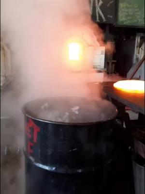 A barrel full of boiling hot water and rapidly cooling glass and a furnace being emptied....this view gets me every time. #glassblowing #hotglass #glassfurnace #frankthefurnace #hotshop #glasslife 