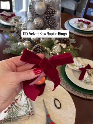 Here’s an easy and elegant way to dress up your table for the holidays! 🎀 I don’t know about you, but I love the velvet bow trend this year and I thought they would make super cute napkin rings for my holiday table this year. 🎄 Here’s a few extra tips that will help make this DIY bow even easier: 🎀Attach the rubber band to a safety pin because it will slide through the bow back much easier. Believe me I tried threading it through without! 😫 Be sure to remove the safety pin when you are all done pulling the rubber band through the bow.  🎀 When it comes to making a bow with velvet, it can be tricky to get all the velvet to face one direction. I like to use 24” of ribbon and fold it the way I show in this video.  🎀What I love about these bows is they look good on any cloth napkin you may have sitting around. All you need is some velvet ribbon or you can do this with any other ribbon you may have on hand!  🎀Save and share with someone who might want be interested in making these bow napkins rings this holiday season.  🎀I hope you will follow along for more home decorating tips and ideas!  #bows #bowtutorial #tablesettingideas #christmasbows #velvetbows #napkinrings #christmastable #christmasdiy #homedecorideas #christmasdecorating #diyprojects #tablesettingideas #napkinfolding 