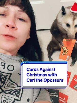 Cards Against Christmas is too much fun! Carl and I shall be playing long after the holiday season ends! #cardsagainstchristmas #cardgames #boardgame #opossumlove #friendless 