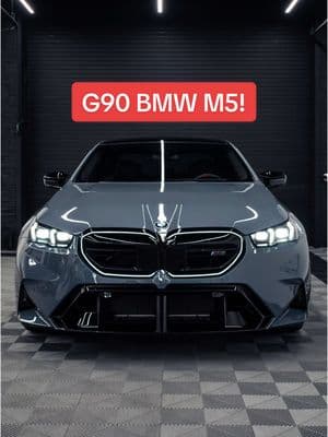 FINALLY! This, is the G90 BMW M5.  The presence this car has is undeniable. Painted in Storm Bay Metallic over black Merino on the 951M high gloss wheels. This one rolled right off the truck into ZGM for a Ceramic Coating Treatment and Protective Window Tint. How do you feel about the new G90 BMW M5?  😮‍💨🏎️💭🧑‍🚀 #bmw #bmwm #bmwm5 #g90m5 #m5 #bmwusa #bmwindividual #bmwclassic #bmwwelt #m5touring #g90 #v8 #whistlemotors #zerogravitymotors 