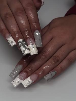 Love these 🤍🩶 #nails #nailtech #nailvideos #nailtutorial #bownails #greynails #graynails #nailinspo #chromenails #nailtech #nailart #frenchtip #pearlnails #3dtextutenails #fypシ゚viral 