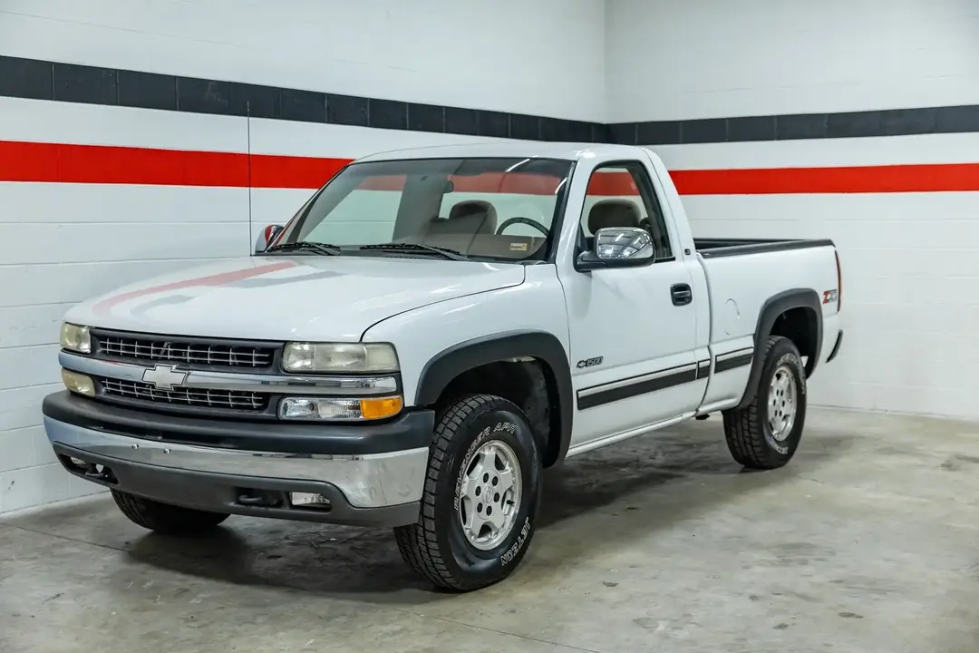 📣SINGLE CAB ANYONE?!📣 1999 Chevrolet Silverado 1500 with 78,000 miles! We are pleased to offer this Carfax-backed 1999 Chevy Silverado 1500 with a clean title. This truck has a white exterior with a tan cloth interior. It is a 8 cylinder gas engine backed by an automatic transmission with 77,995 original miles. Well-equipped with: 🔓Power locks, windows, and mirrors 🪑Bench Seats 🛞Tires: Jetzon Revenger APR 265/75/16 🛞Four-Wheel-Drive ⚙Automatic Transmission 💪5.3L  Engine ✔️LOW Miles Price: $23,900 We are located in Springfield Missouri with shipping options nationwide. #truckstuff  #truck  #dealership  #dealershiplife  #4x4  #fourwheeldrive  #enterprisemotorsports  #lifted  #liftedtrucks  #forsale  #halfton  #halfton  #oneton  #dealershiplife  #trucktok  #trucktalk  #lowmiles  #manuel  #firstgen  #secondgen #thirdgen #gas  #diesel  #lbz  #vortec  #sixoh  #eightone #fyp #fypage 