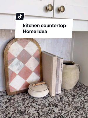 kitchen countertop decor idea 🤍 + marble checkered cutting board to hide outlet + recipe books + trinket dish for trinkets or candy  + pitcher vase as a bookend #homedecor #kitchendecor #kitchenstyling #kitchentips #neutralhome #interiorinspo #latinacreator 