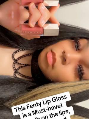 I love this lip gloss, it is now one of my favorites! I love that it's non-sticky and cruelty free. It gives your lips a glossy shine. This Lip Gloss duo is definitely a must-have. #fentybeauty #fentybeautylipgloss #lipgloss #beauty #rihanafenty #highshinelipgloss #lipcare #MakeupRoutine #lipcareroutine #lipcareproducts #fenty #lipcaretok #makeup #makeuptiktok #merrychristmas #holidayseason #giftideas #makeuptutorial #trendingmakeup #makeuphacks #makeupartist #makeupfyp #fentyskin #skincare #rihanna #rihannafenty #fentymakeup #fyp #foryoupage #fypmakeup #lipstick #merrychristmas #makeuptransformation #fashion #skincare #skin #skincareroutine #lip #lips